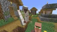 Iron Golem giving poppy to a villager in Minecraft (Image via Mojang)